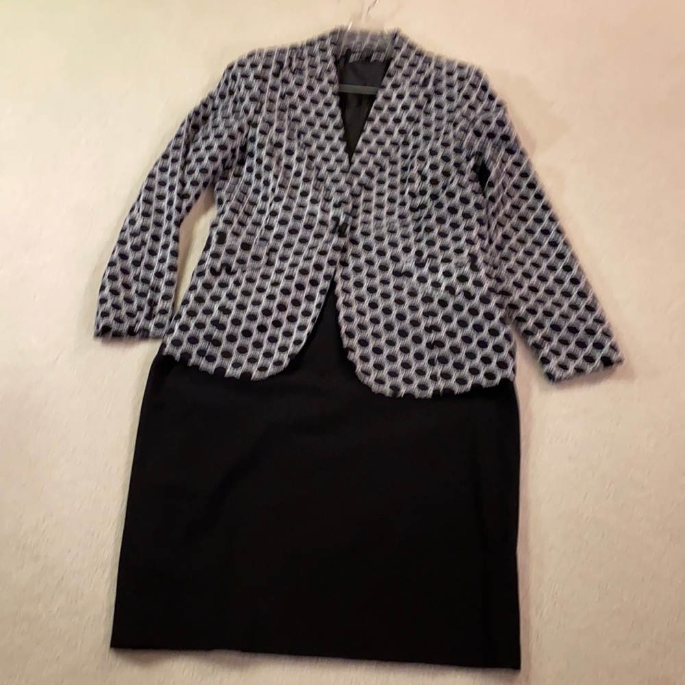 Signature by Larry Levine suit. Black skirt with patterned jacket.